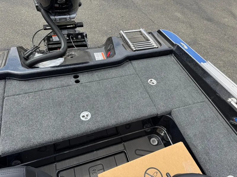 Slide: The Image of 2025 Nitro ZV21 Pro boat deck with storage compartments and motor components. - 14