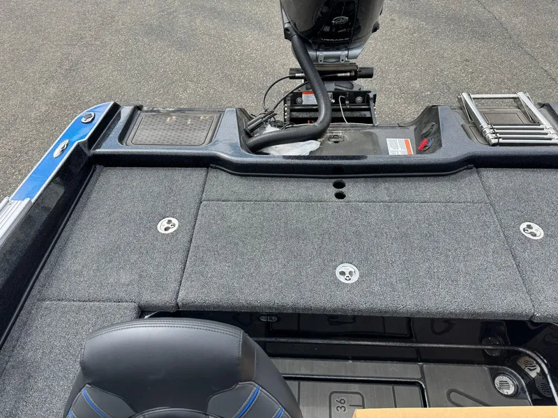 Slide: The Image of Nitro ZV21 Pro 2025 boat interior with motor and seating, featuring a sleek design. - 15