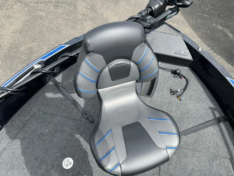 Slide: The Image of Nitro ZV21 Pro 2025 boat seat with blue accents on deck. - 17