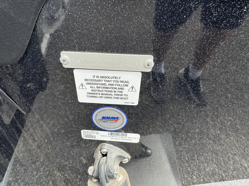 Slide: The Image of 2025 Nitro ZV21 Pro boat warning label and identification plate. - 6