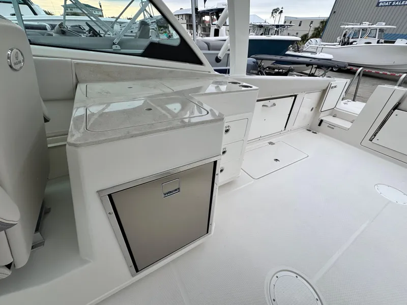 Slide: The Image of 2025 Sailfish 316 DC boat interior with sleek design and modern amenities. - 18