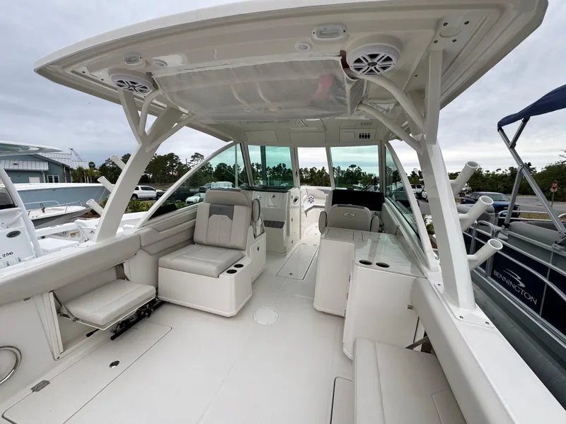Slide: The Image of 2025 Sailfish 316 DC boat interior with spacious seating and modern design. - 22