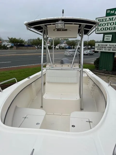 Slide: The Image of 2007 May-Craft 2300CC boat with T-top, parked near Belmar Motor Lodge. - 5