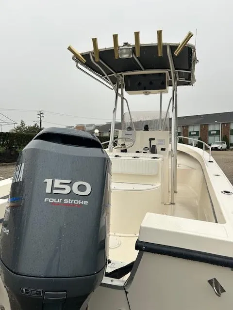 Slide: The Image of 2007 May-Craft 2300CC boat with Yamaha 150 four-stroke engine, featuring a T-top. - 8