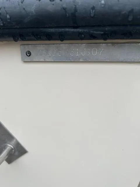 Slide: The Image of Close-up of a 2007 May-Craft 2300CC boat identification plate. - 9