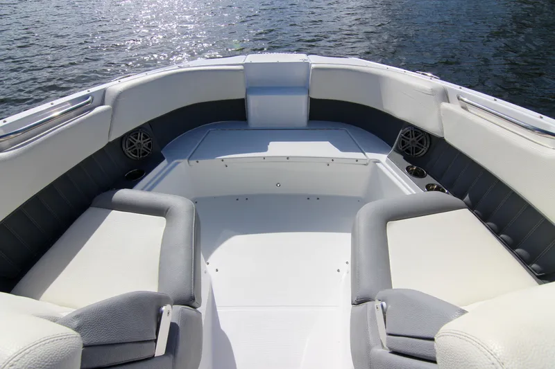 Slide: The Image of 2021 Cobalt 25SC boat interior with spacious seating and water view. - 29