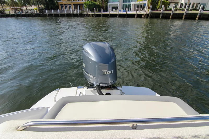 Slide: The Image of 2021 Cobalt 25SC boat with Yamaha 300 outboard motor on calm water. - 39