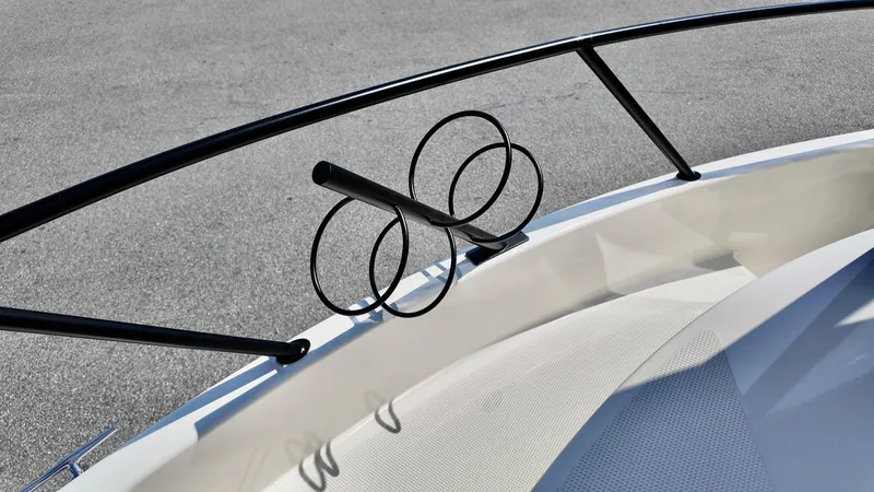 Slide: The Image of 2025 Bayliner Trophy 23 Pilothouse bow detail with sleek railing design. - 11