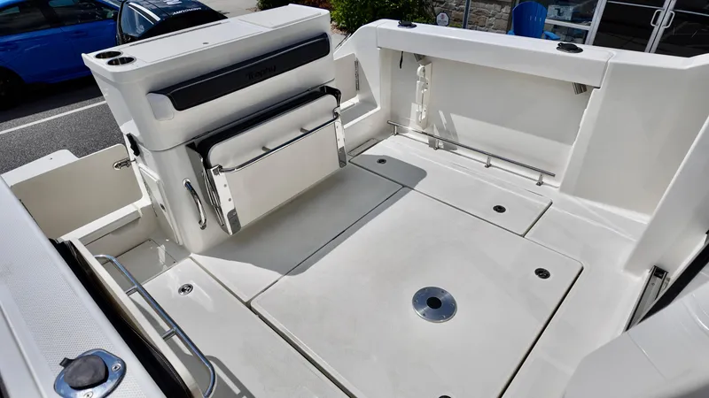 Slide: The Image of 2025 Bayliner Trophy 23 Pilothouse boat deck, spacious and well-equipped for fishing or leisure. - 9