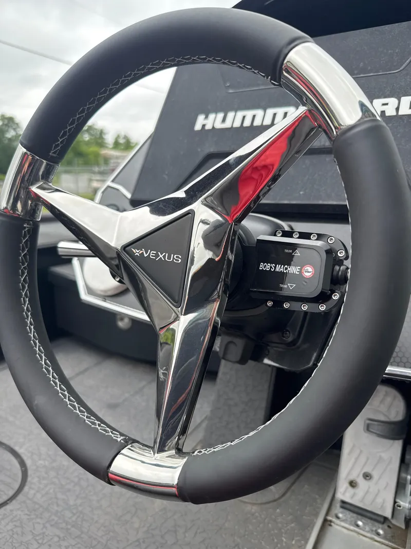 Slide: The Image of Steering wheel of 2025 Vexus VXS20 boat with Hummingbird system. - 15