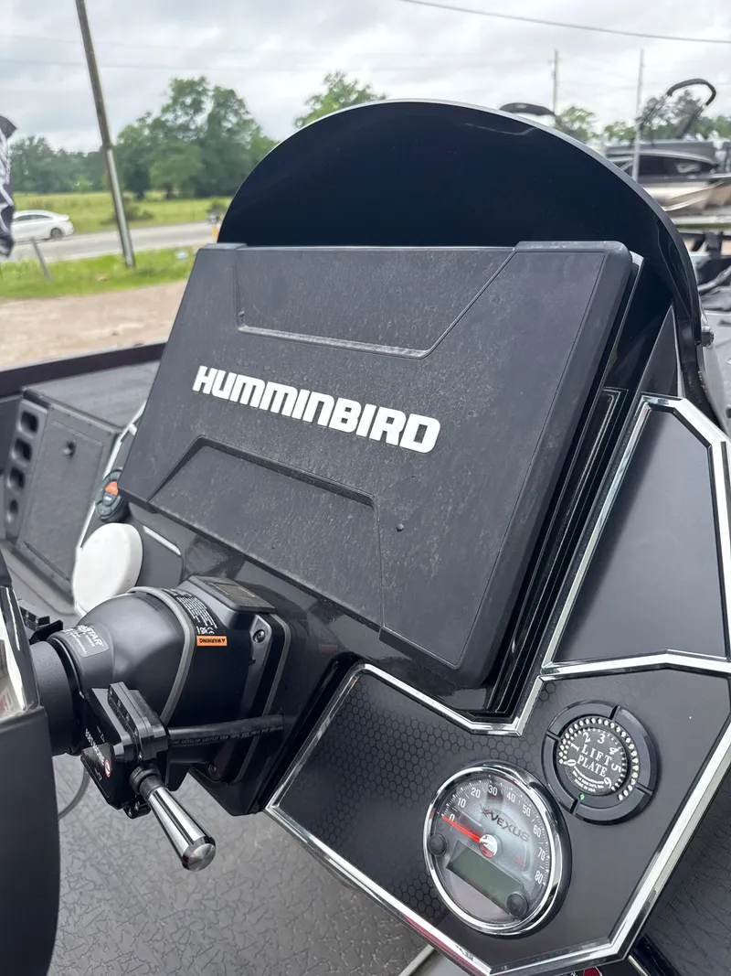 Slide: The Image of 2025 Vexus VXS20 boat dashboard with Humminbird electronics and gauges. - 16