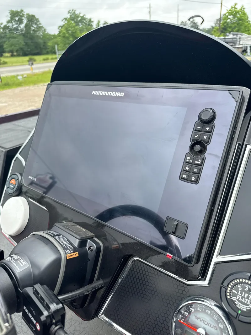 Slide: The Image of Dashboard of 2025 Vexus VXS20 boat featuring a Humminbird display and controls. - 17