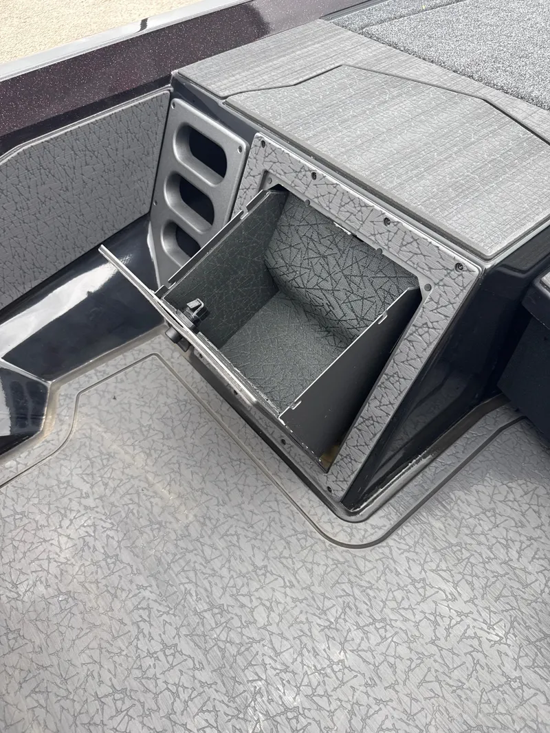 Slide: The Image of 2025 Vexus VXS20 boat storage compartment with open hatch, showcasing interior design. - 30