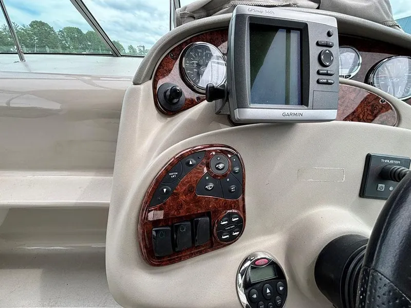 Slide: The Image of Dashboard of a 2007 Sea Ray 280 Sundancer with Garmin GPS and control panel. - 10