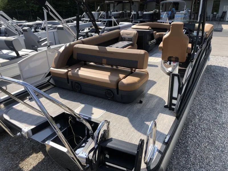 Slide: The Image of 2025 Bennington M L-Bench 22ML pontoon boat with spacious seating and modern design. - 4