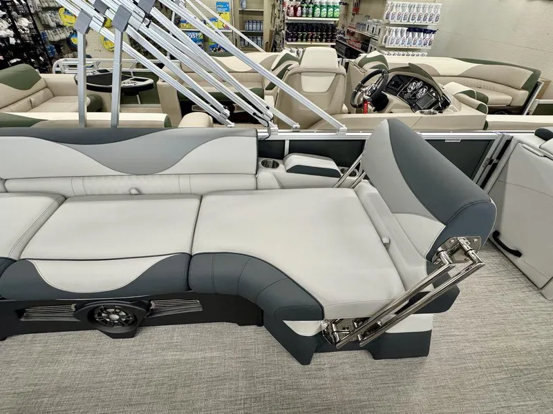 Slide: The Image of 2025 Tahoe LTZ 2385 QLS pontoon boat interior with luxurious seating and modern design. - 15