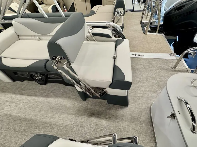 Slide: The Image of 2025 Tahoe LTZ 2385 QLS pontoon boat interior with luxurious seating and modern design. - 16