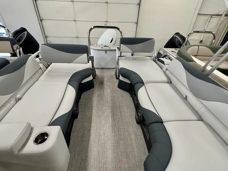 Slide: The Image of 2025 Tahoe LTZ 2385 QLS pontoon boat interior with luxurious seating and modern design. - 6