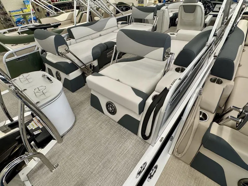 Slide: The Image of 2025 Tahoe LTZ 2385 QLS pontoon boat interior with plush seating and modern amenities. - 8
