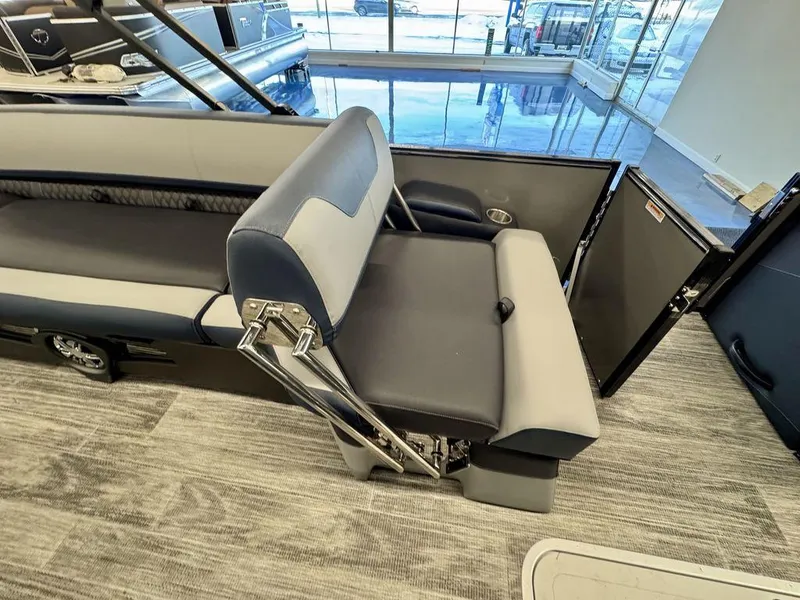 Slide: The Image of 2025 Tahoe Cascade 2585 QLS boat interior with adjustable seating and modern design. - 12