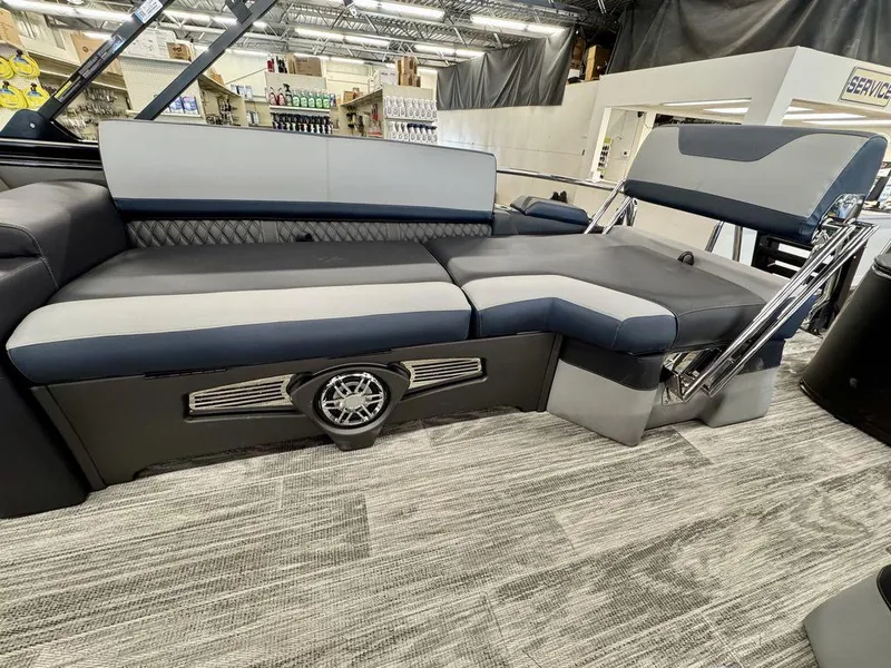 Slide: The Image of 2025 Tahoe Cascade 2585 QLS boat interior with luxurious seating and modern design. - 13
