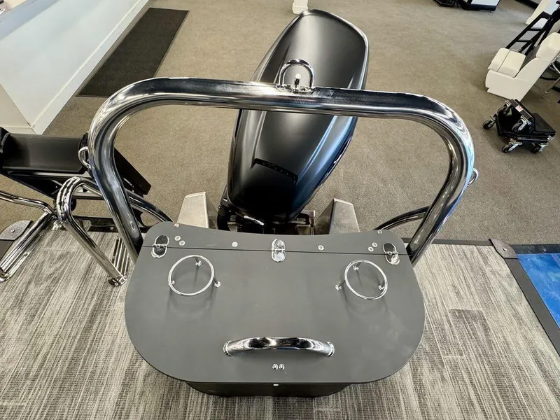 Slide: The Image of 2025 Tahoe Cascade 2585 QLS boat helm with sleek design and modern controls. - 16