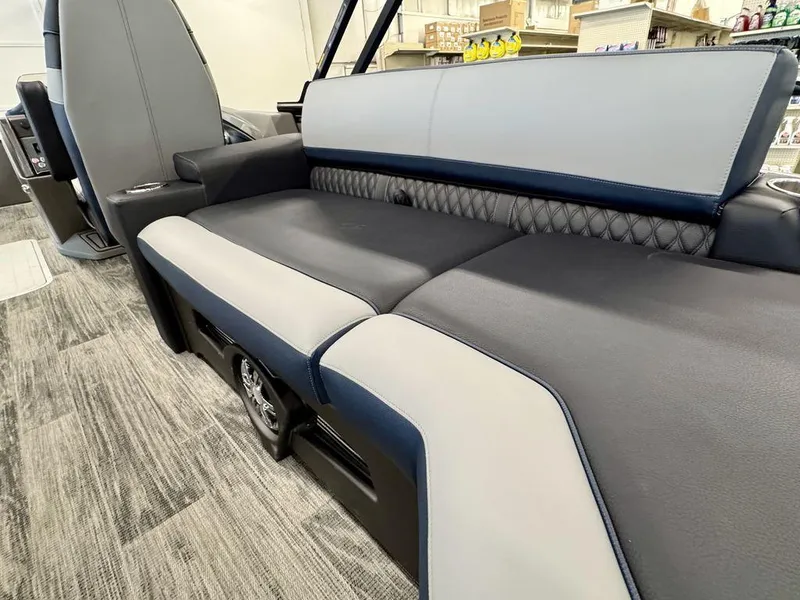 Slide: The Image of 2025 Tahoe Cascade 2585 QLS boat interior with luxurious seating and modern design. - 17