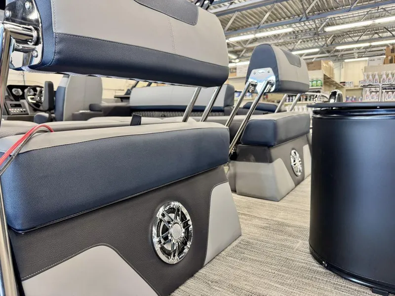 Slide: The Image of 2025 Tahoe Cascade 2585 QLS interior with modern seating and speaker system. - 4