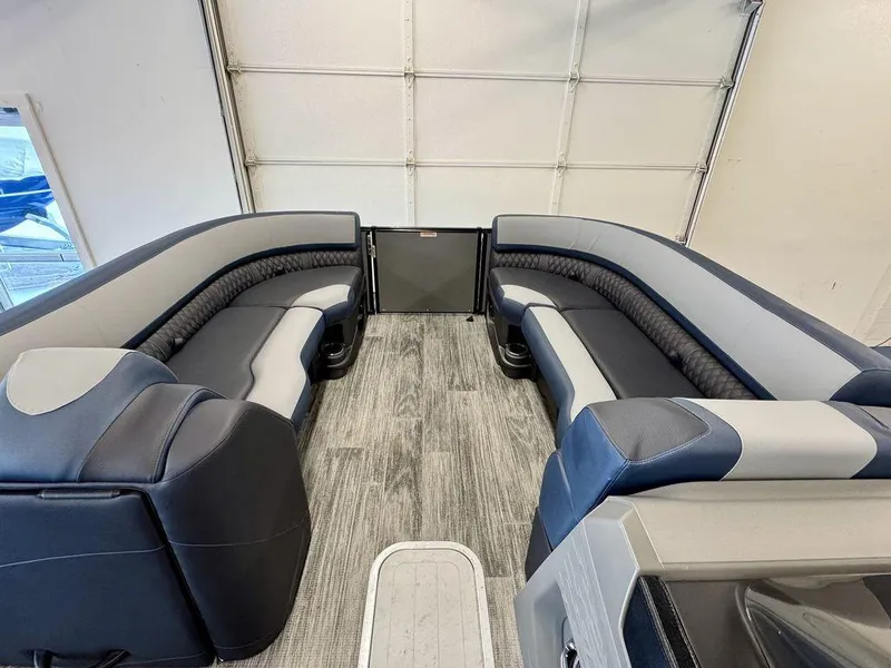 Slide: The Image of 2025 Tahoe Cascade 2585 QLS interior with sleek, modern seating and stylish design. - 6