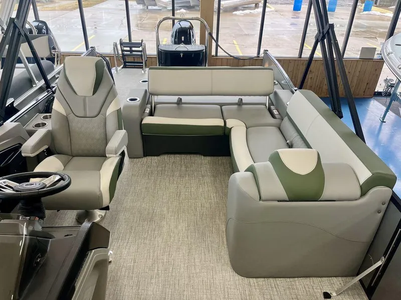 Slide: The Image of 2025 Tahoe Cascade 2385 VRB interior with plush seating and modern design. - 12