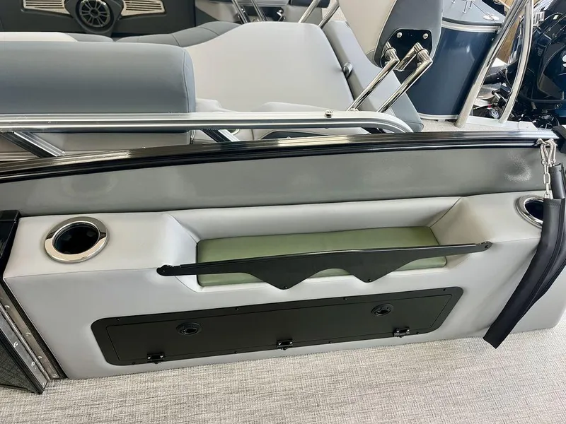 Slide: The Image of 2025 Tahoe Cascade 2385 VRB interior with cup holders and sleek seating design. - 14