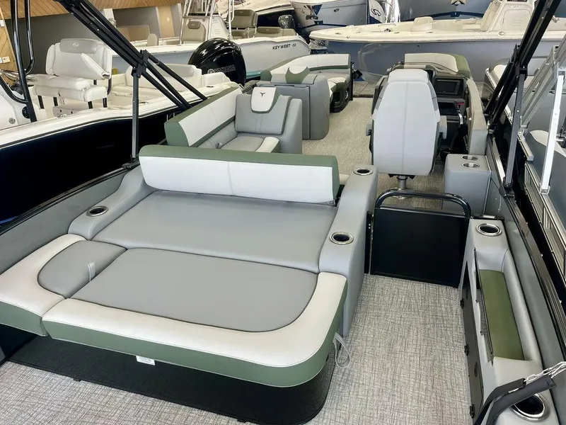 Slide: The Image of 2025 Tahoe Cascade 2385 VRB boat interior with luxurious seating and modern design. - 15