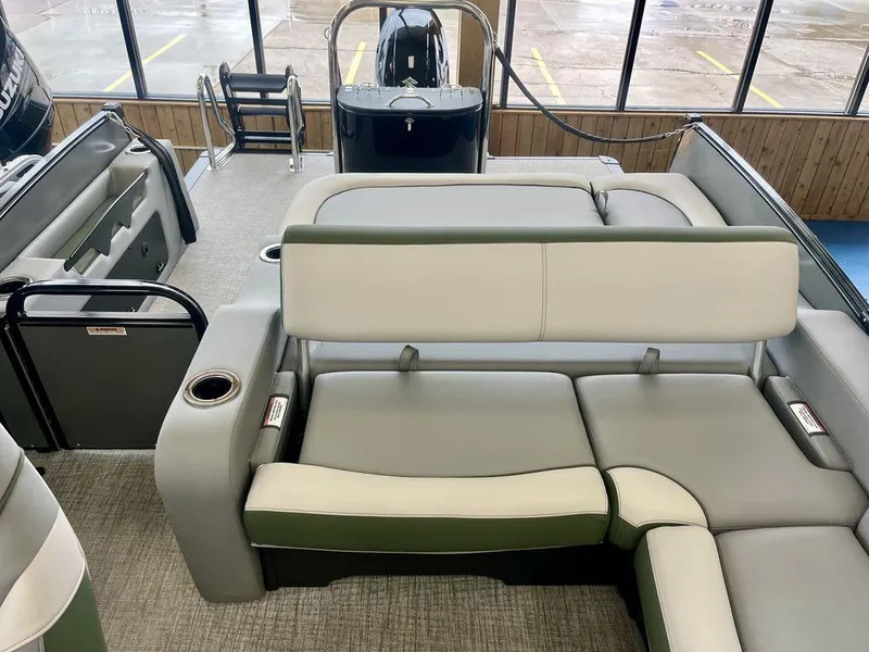 Slide: The Image of 2025 Tahoe Cascade 2385 VRB pontoon boat interior with plush seating and modern design. - 17