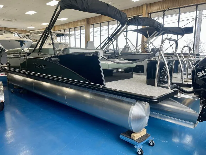 Slide: The Image of 2025 Tahoe Cascade 2385 VRB pontoon boat displayed indoors on blue floor. - 5