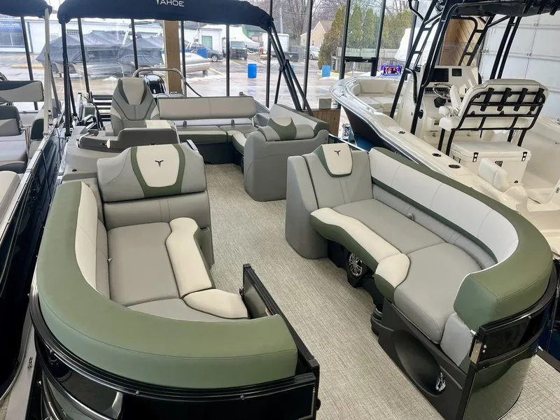 Slide: The Image of 2025 Tahoe Cascade 2385 VRB pontoon boat with spacious seating and modern design. - 8