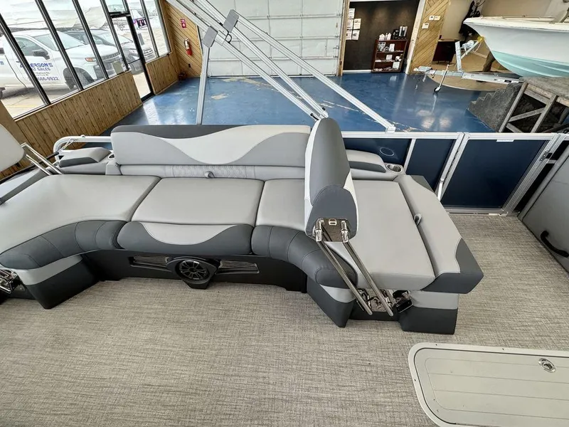 Slide: The Image of 2025 Tahoe LTZ 2385 QLS pontoon boat interior with gray seating and adjustable backrest. - 11