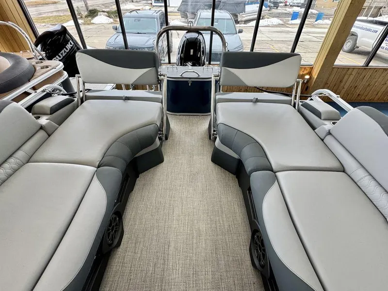 Slide: The Image of Interior of 2025 Tahoe LTZ 2385 QLS pontoon boat with luxurious seating. - 13