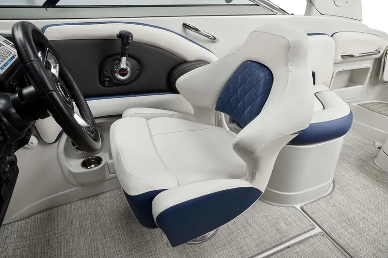 Slide: The Image of 2024 Crownline 250 XSS boat interior with plush seating and modern controls. - 5