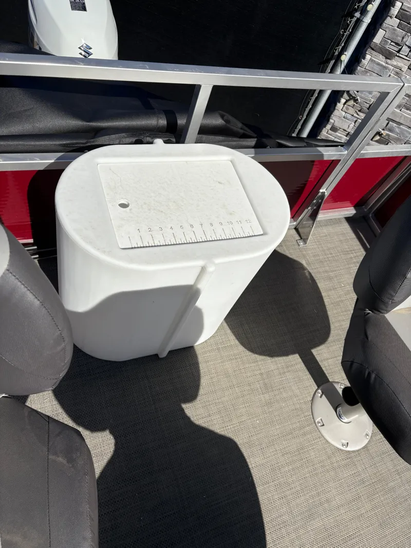 Slide: The Image of 2025 Custom Maui 16 Fisherman boat interior with measuring station and seating. - 7