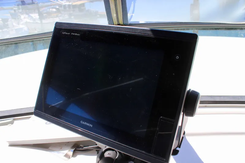 Slide: The Image of Garmin navigation system on 1999 Bayliner 4788 Motoryacht dashboard. - 27