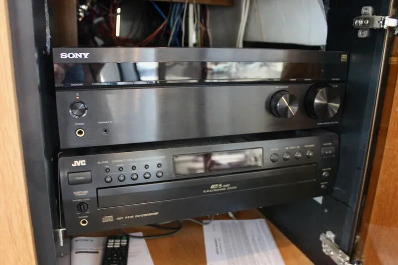 Slide: The Image of Audio equipment in a 1999 Bayliner 4788 Motoryacht, featuring Sony and JVC components. - 48