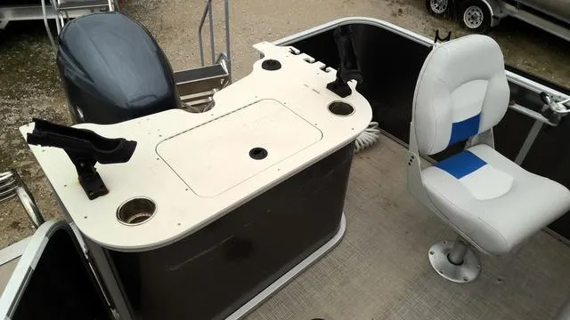 Slide: The Image of 2020 SunCatcher V322 F boat interior with fishing station and swivel chair. - 10