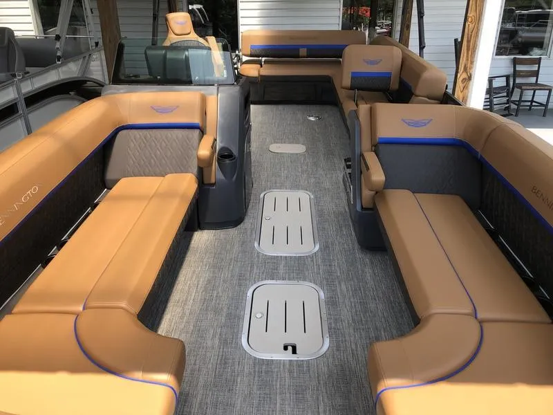 Slide: The Image of 2025 Bennington M L-Bench 24ML pontoon boat with spacious seating and modern design. - 3