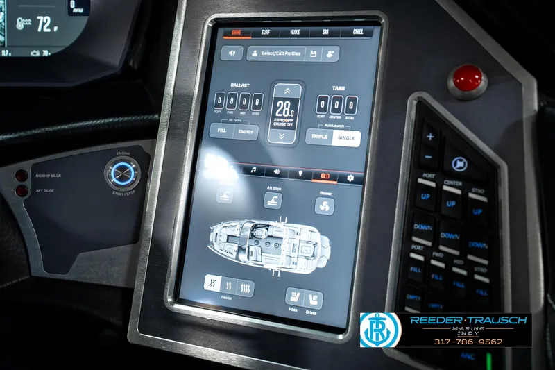 Slide: The Image of 2025 MasterCraft X24 dashboard with touchscreen controls and navigation display. - 44