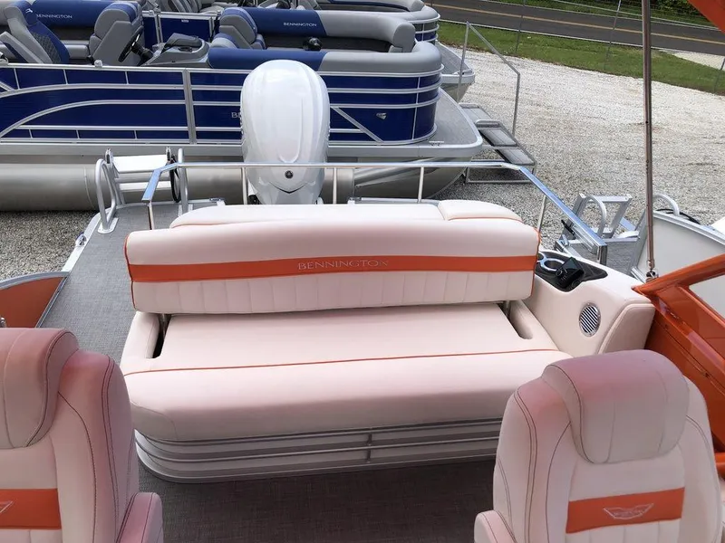 Slide: The Image of 2024 Bennington 24 LXSSBA pontoon boat with stylish seating and modern design. - 5