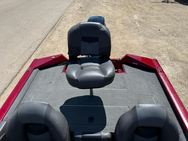 Slide: The Image of 2019 Tracker Pro Team 175 TXW boat with gray seating and red accents. - 18