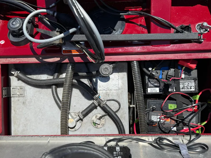 Slide: The Image of 2019 Tracker Pro Team 175 TXW boat battery compartment with wiring and components. - 23