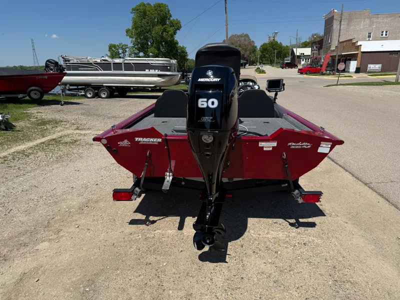 Slide: The Image of 2019 Tracker Pro Team 175 TXW boat with Mercury 50 engine, parked outdoors. - 6