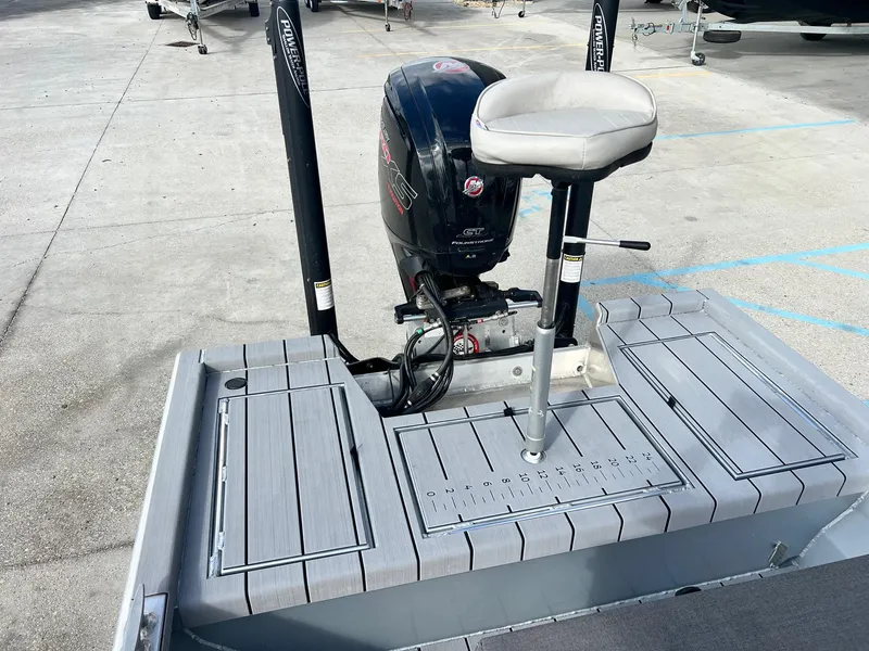 Slide: The Image of Hanko 185 CCLS 2022 boat with Power-Pole anchors and cushioned seat on deck. - 15