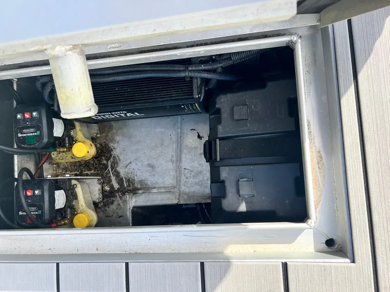 Slide: The Image of Compartment of a 2022 Hanko 185 CCLS boat showing electrical components and battery storage. - 5